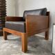 Modernist armchair in exotic wood and leather