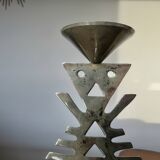 Ethnic “skeleton” candle holder in nickel-plated brass from the 80s