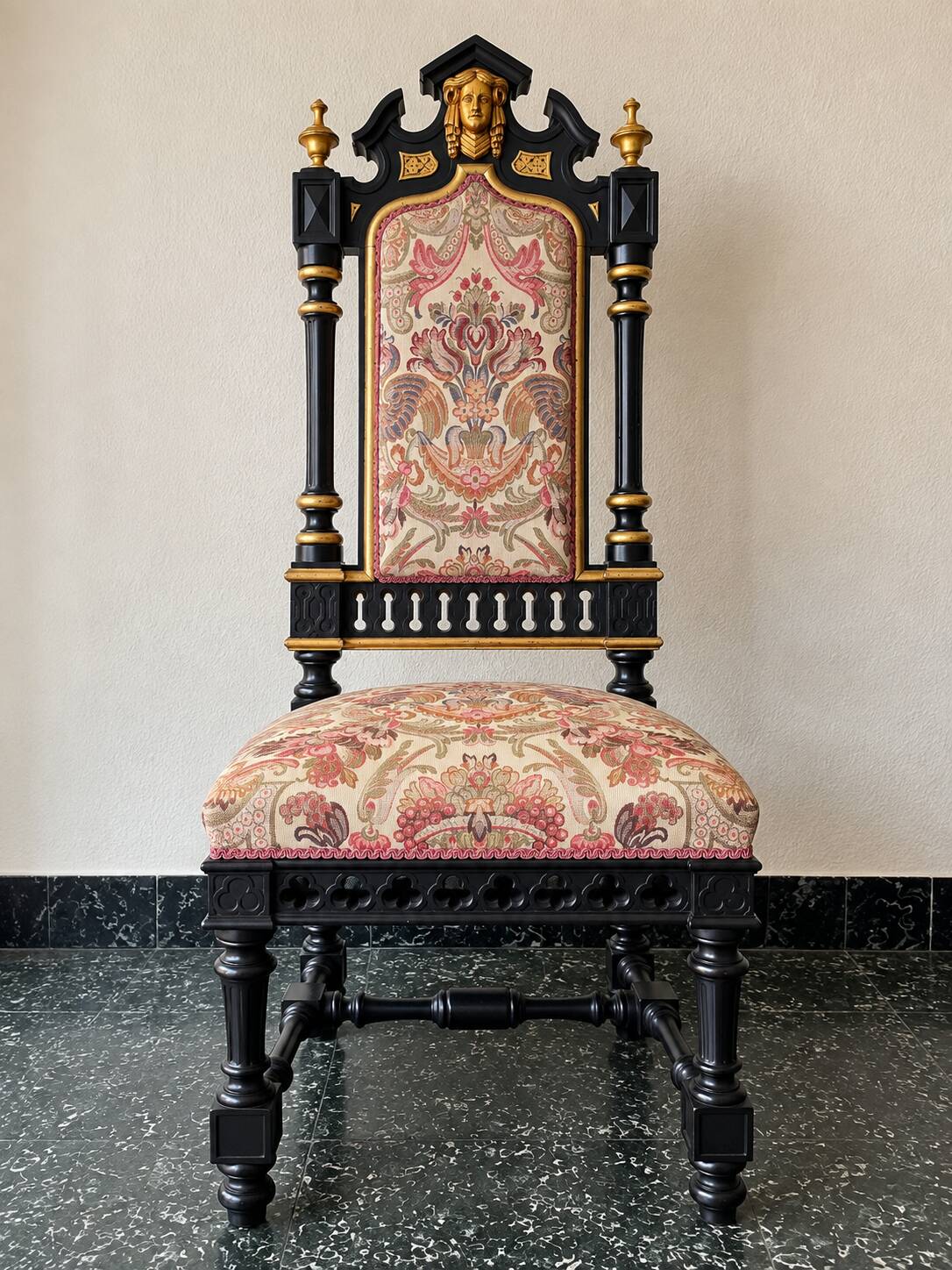 Historicist chair in ebonised and gilded wood