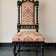 Historicist chair in ebonised and gilded wood