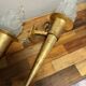 Pair of large medieval-style torchiere lamps in gilded metal