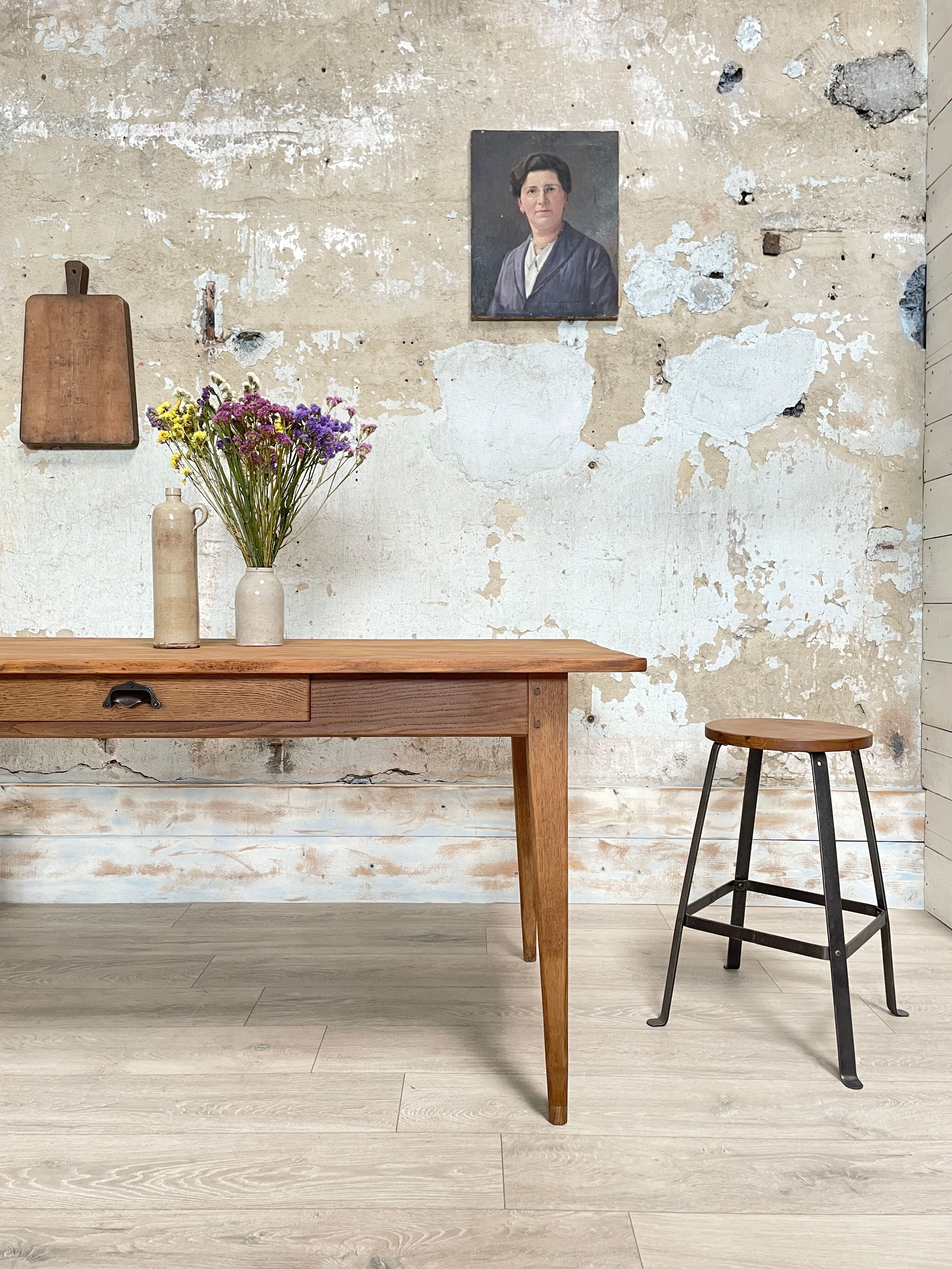 Vintage farmhouse table with spindle legs.