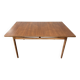 Extendable dining table in teak by Ib Kofod-Larsen
