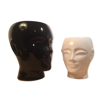 2 black and white ceramic head vases, face