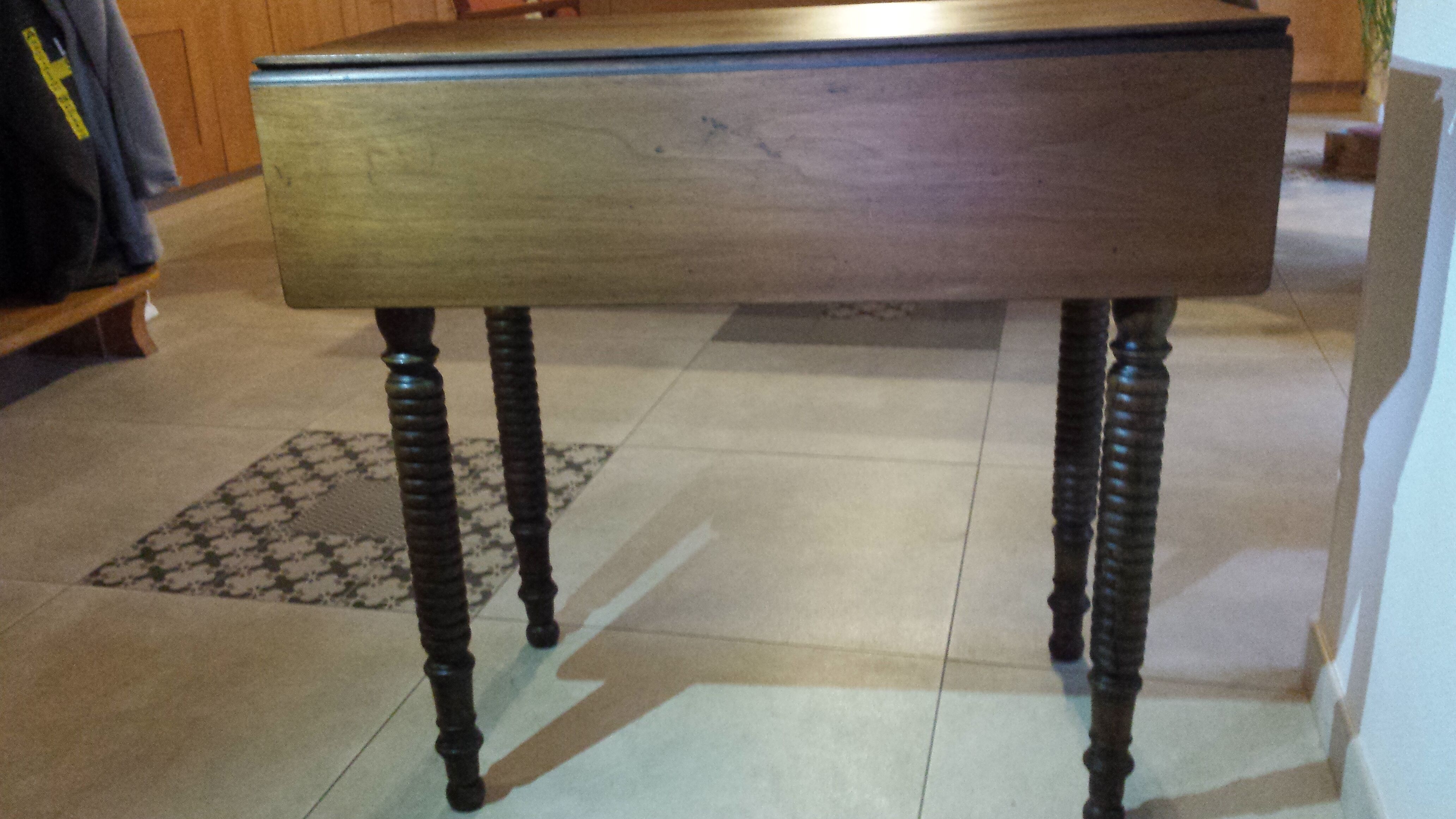 Wooden table with extensions