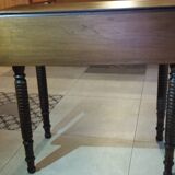 Wooden table with extensions