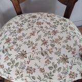 Pair of Provencal armchairs in brown wood and floral fabric