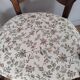 Pair of Provençal armchairs in brown wood and floral fabric.