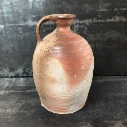 Old varnished sandstone jug