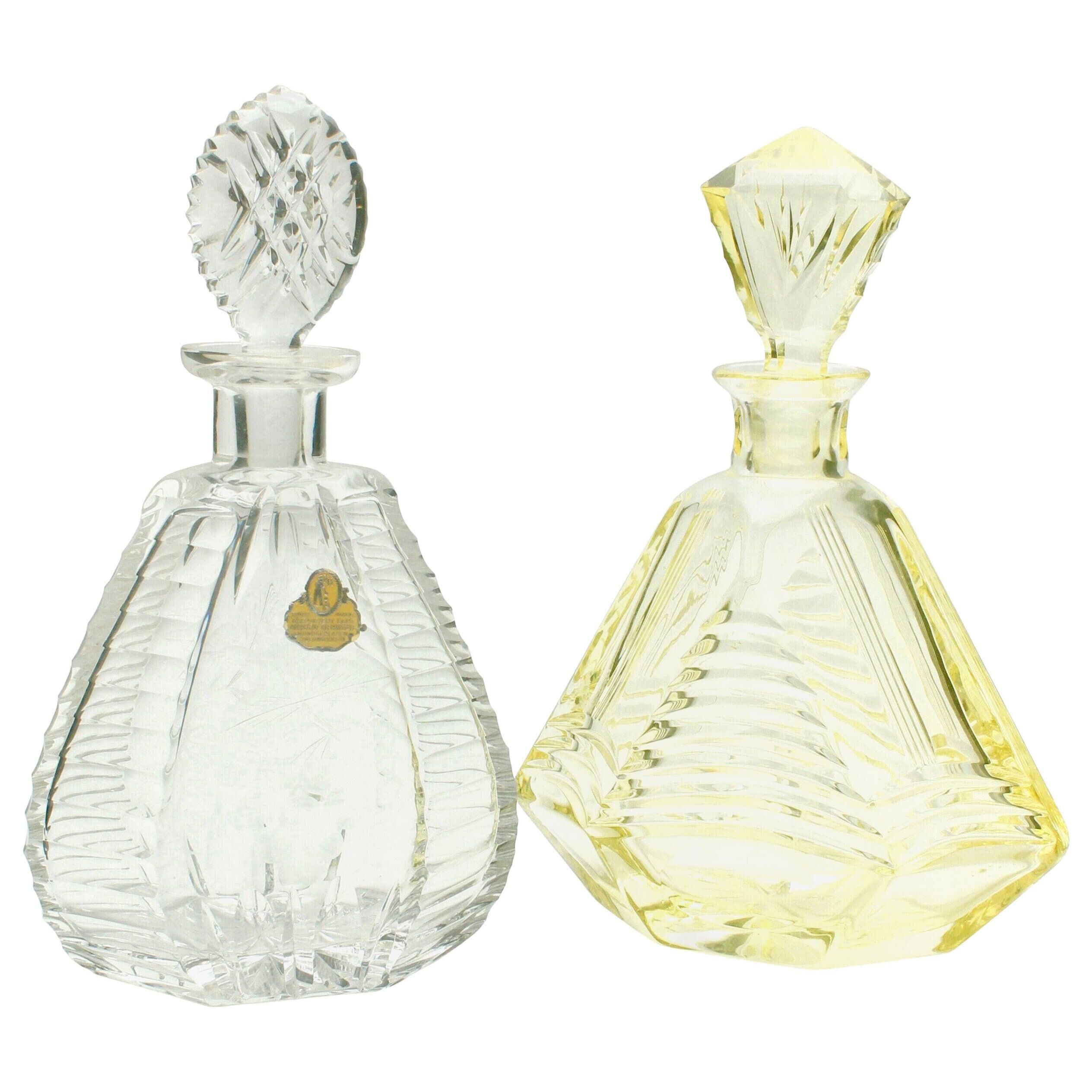 Matching pair of bohemian crystal decanters with art deco motifs