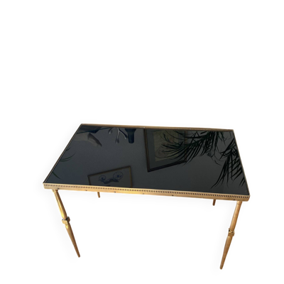 Table basse en laiton massif et plateau en verre noir