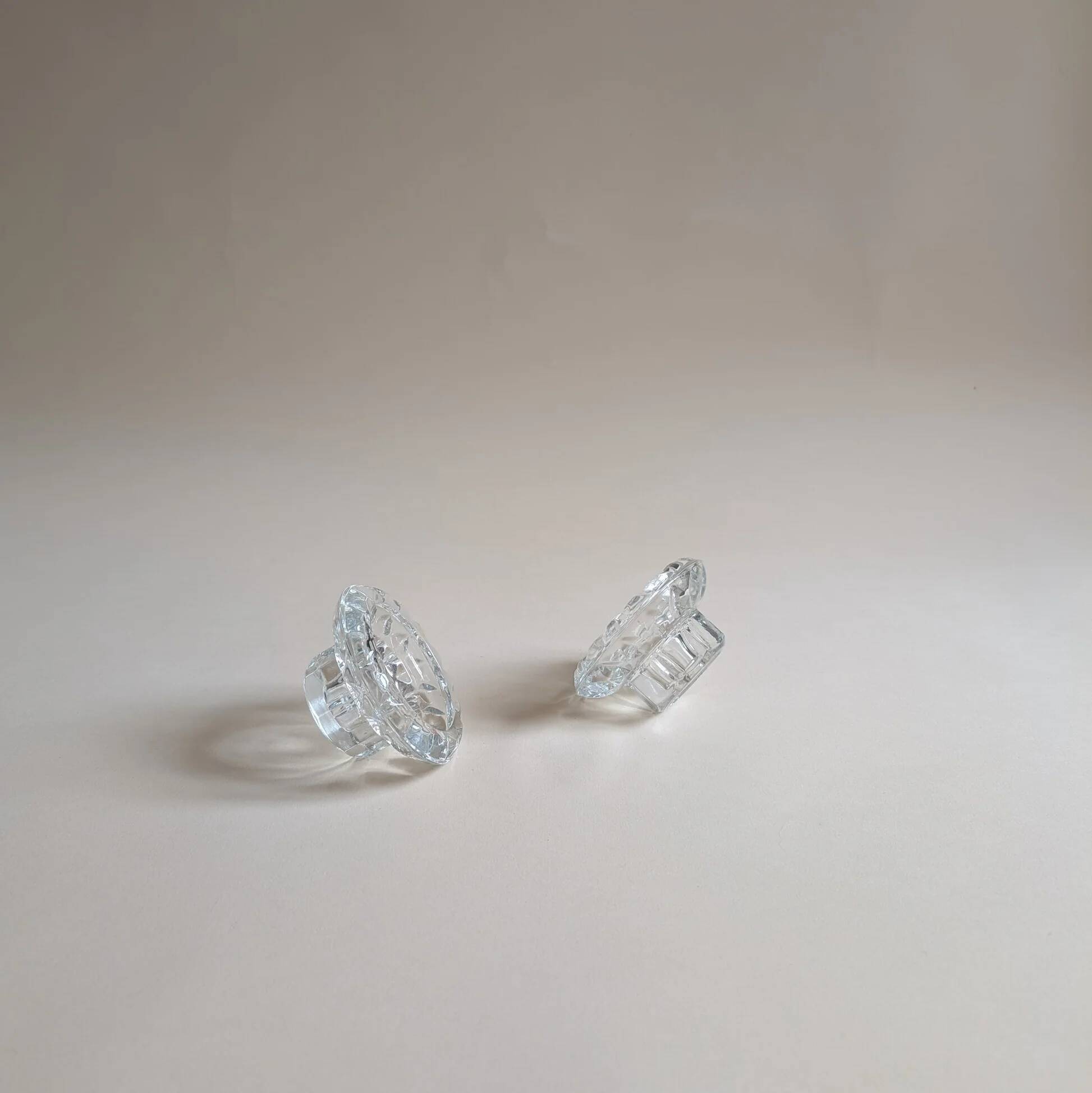 Pair of chiseled glass candlesticks, octagonal base