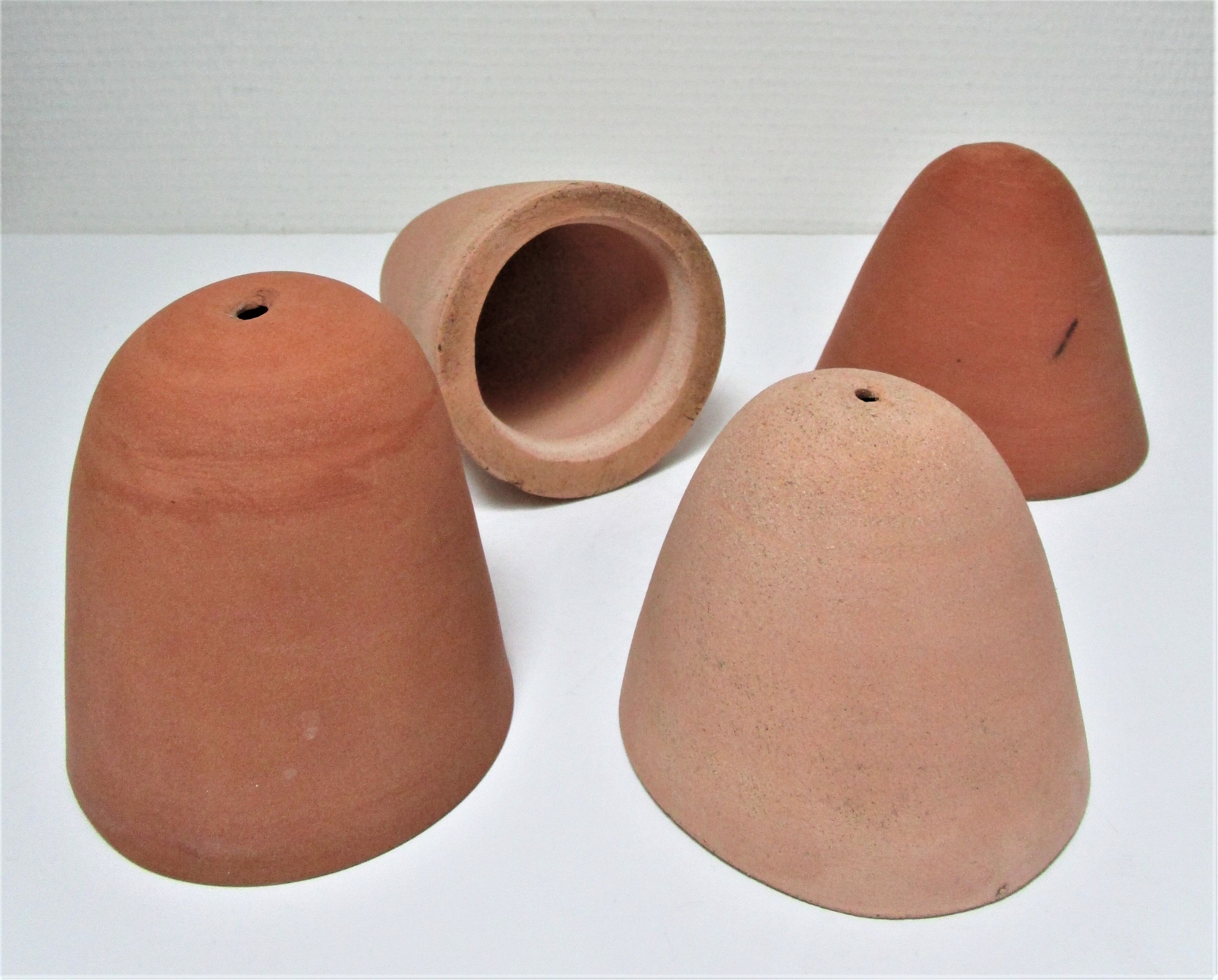 Four bells for seedlings in vintage terracotta