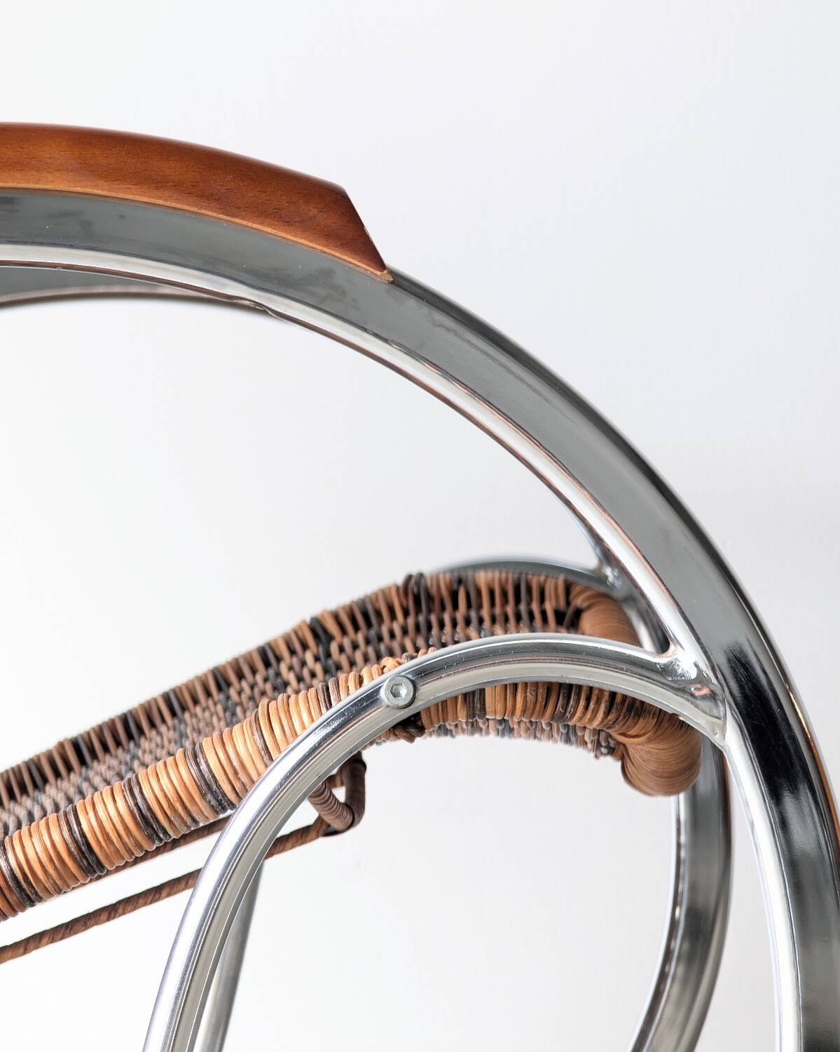 Vintage Thonet rocking chair in chrome and rattan, 1970.