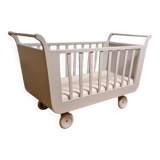 Renovated old cot with wheels