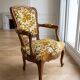 Louis XV armchair in wood and yellow and green floral fabric