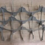 Minimalist sculptural coffee table in metal and glass
