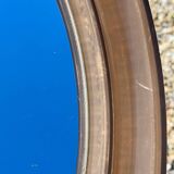 Vintage round smoked plastic mirror, circa 1970s.