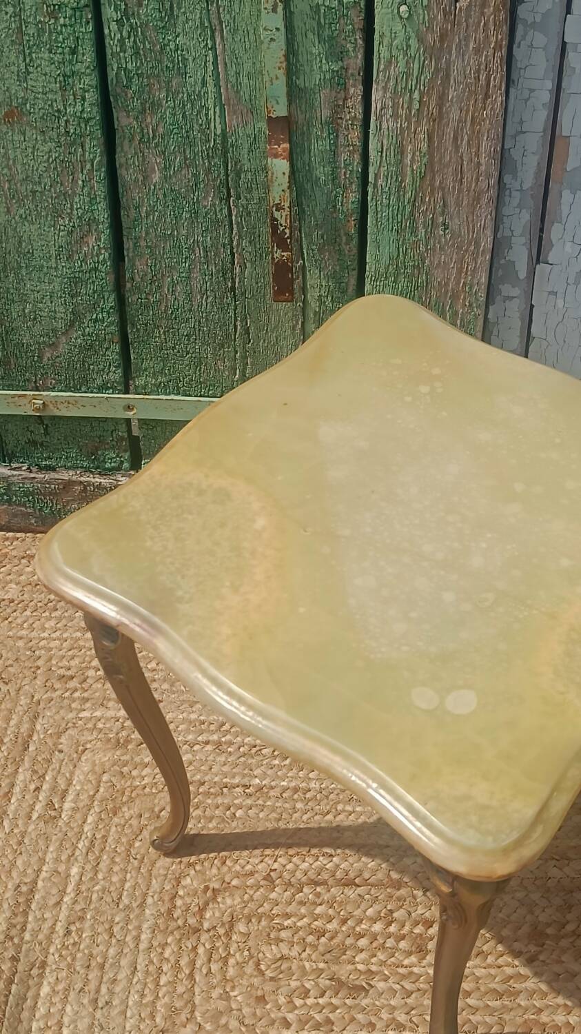 Vintage side table in gilded brass with an onyx top.