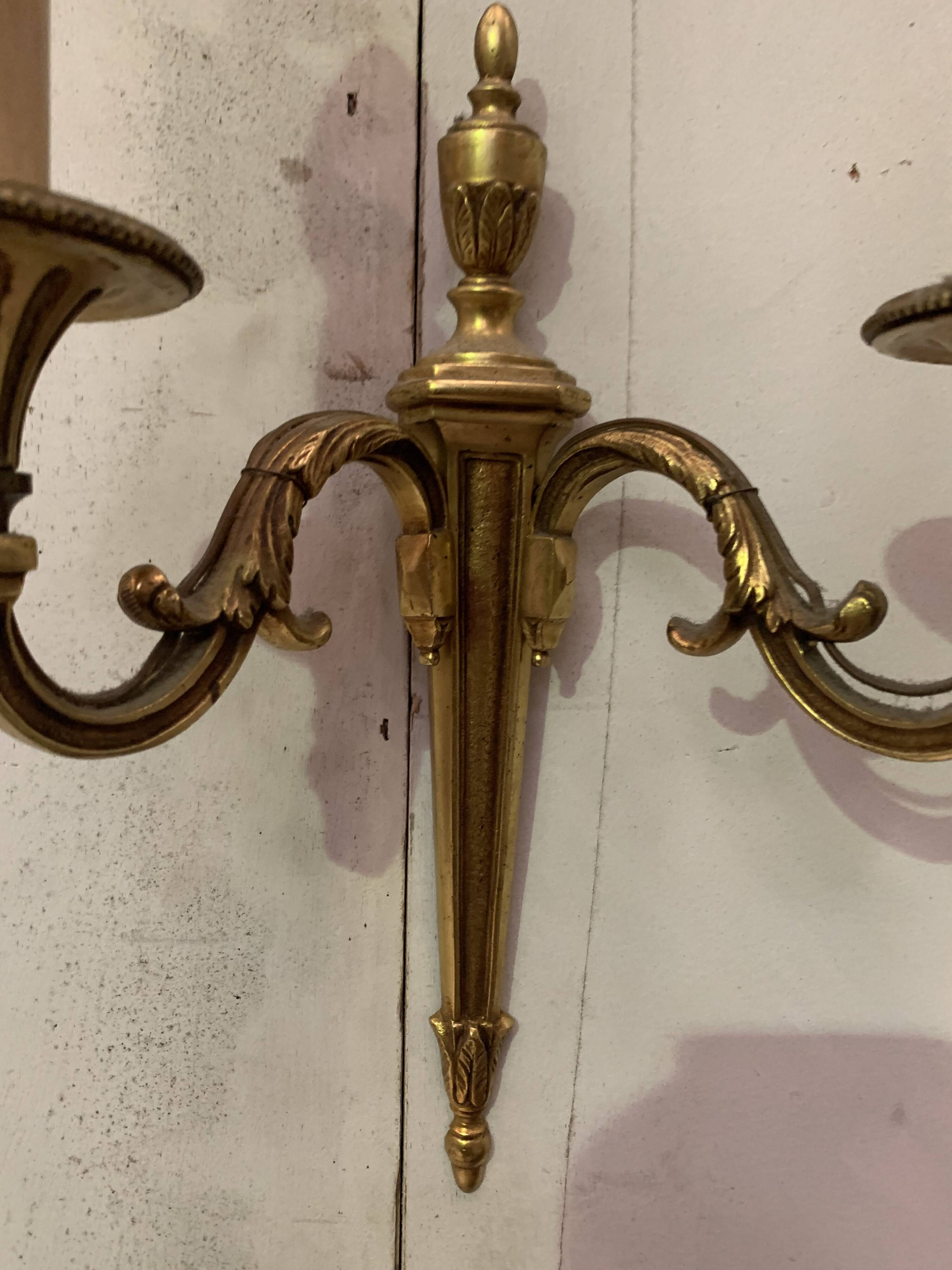Pair of Louis XV style sconces in gilded bronze XX century