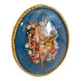 Oval frame bouquet of dried flowers with curved glass