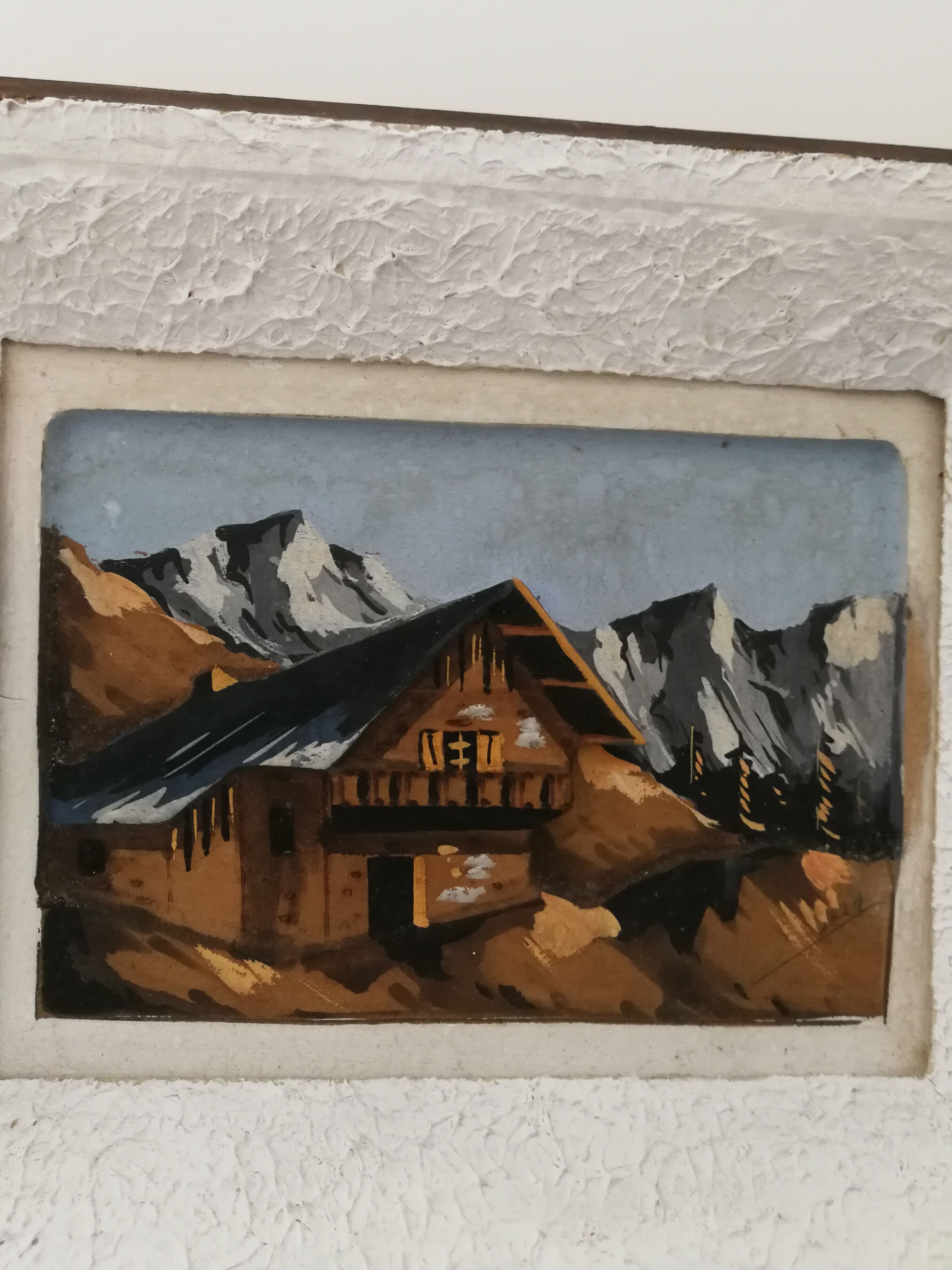 Cadre d'un chalet à la montagne en relief