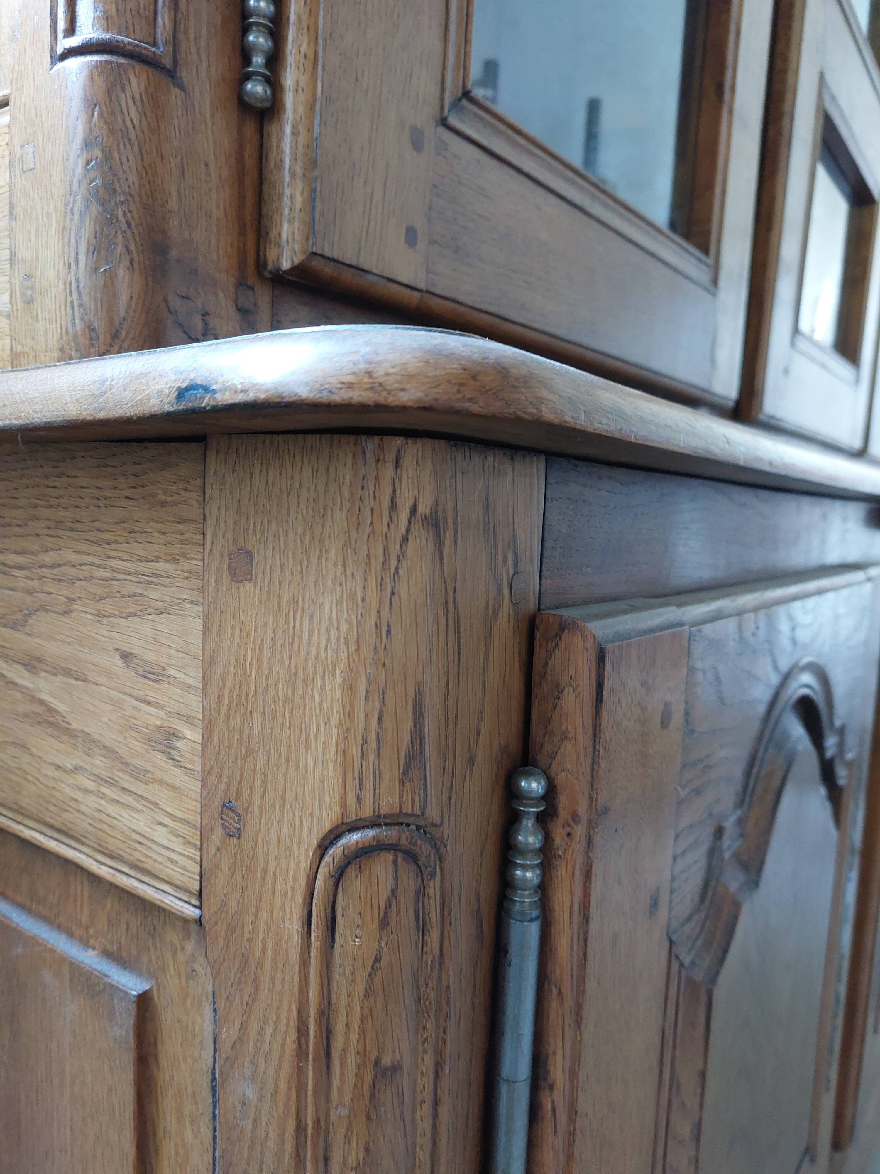 Showcase library with two sections in solid oak.