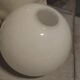 White ceramic sea lion lamp and opaline globe