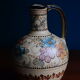 Hand-painted terracotta jug