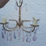 Antique chandelier with its papillae, reflection changing according to exposure