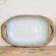2 blue stoneware dishes