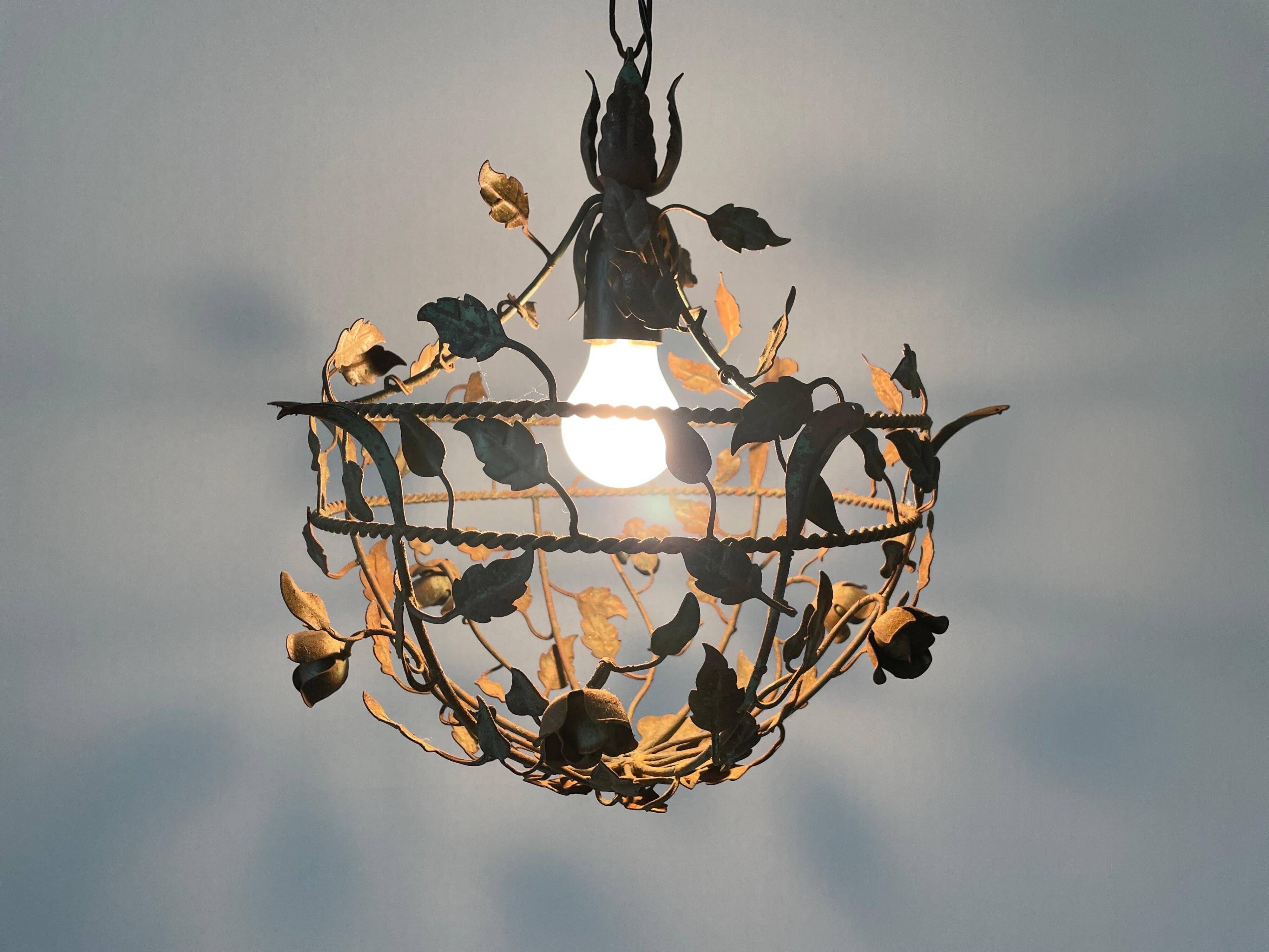 Patinated metal ceiling light with a floral and leaf pattern, 1950s, Italy.