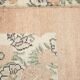 Tapis en laine et coton à décor floral