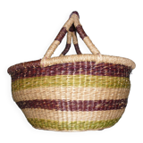 Round and colorful straw basket with handles