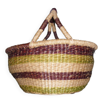 Round and colorful straw basket with handles