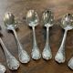 Series of 12 Christofle model Marly dessert spoons in silver metal