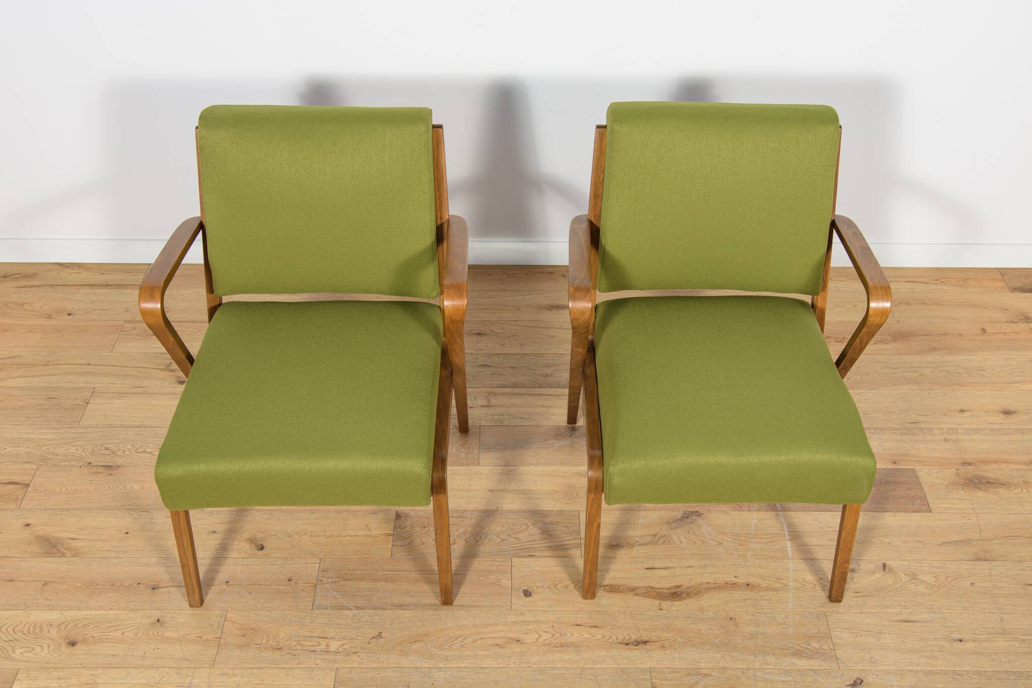 Armchairs by Selman Selmanagic for VEB Deutsche Werkstätten Hellerau.