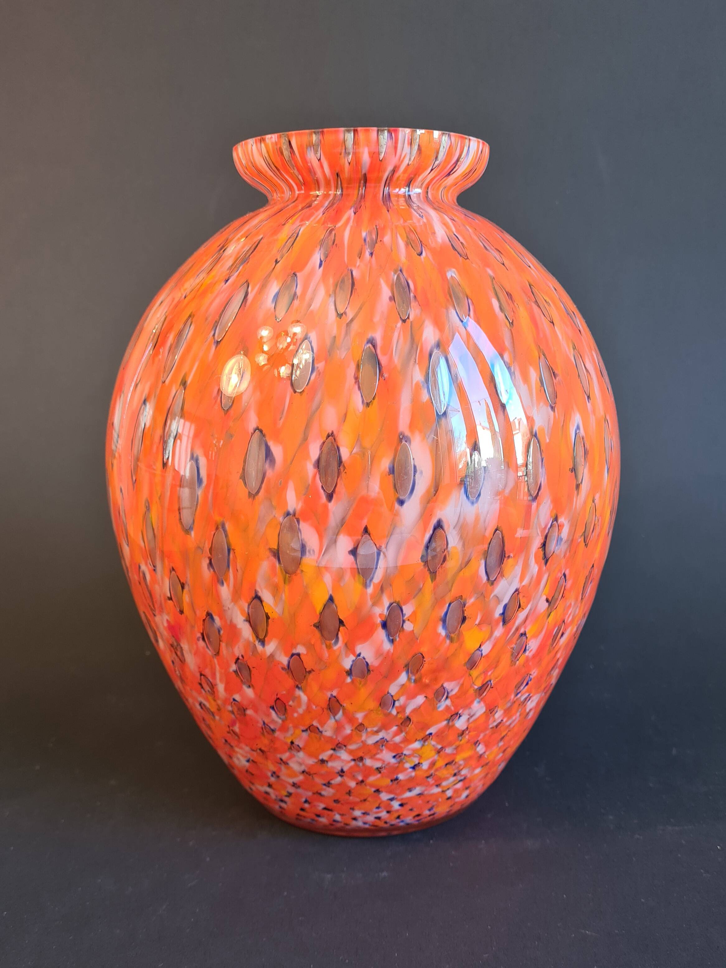 Shimmering orange blown glass vase