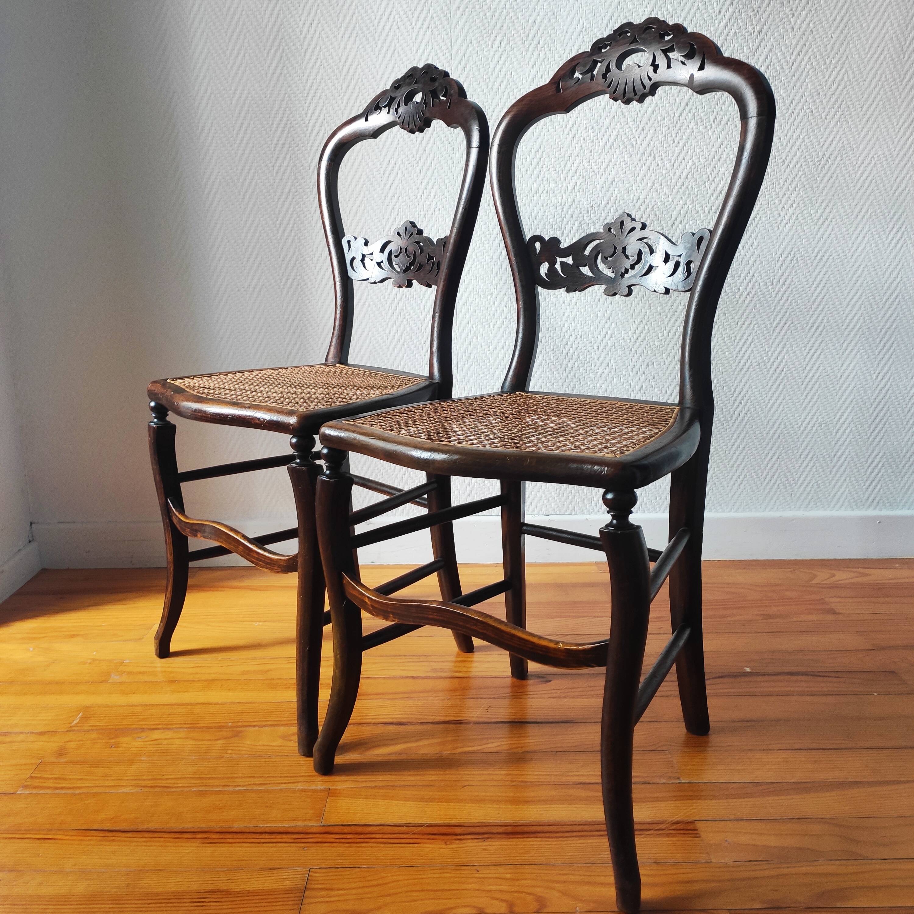 Pair of chairs from the early 20th century, Napoleon III style, with caned seats.