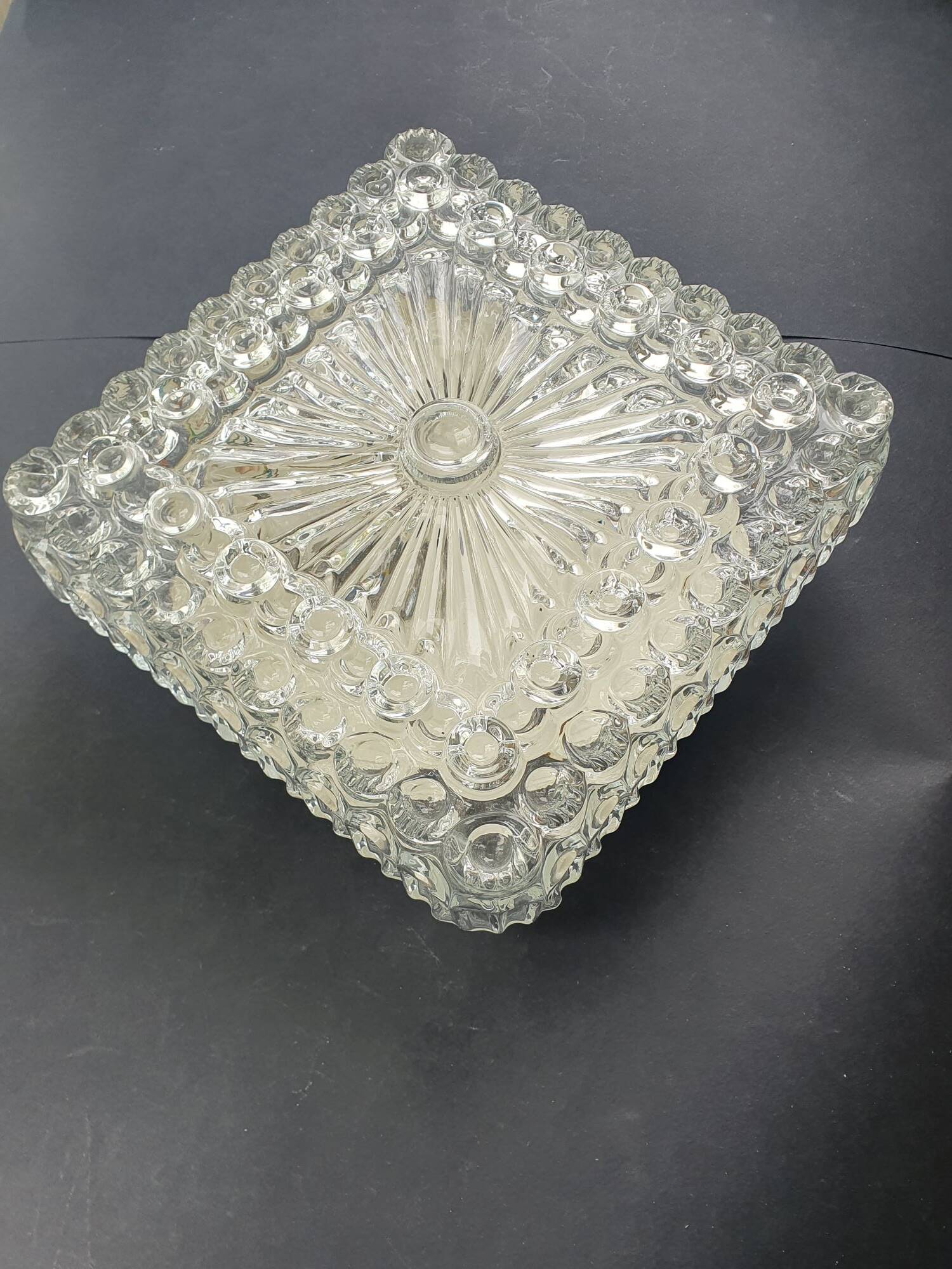 Large ceiling light or vintage wall sconce from the 1970s.