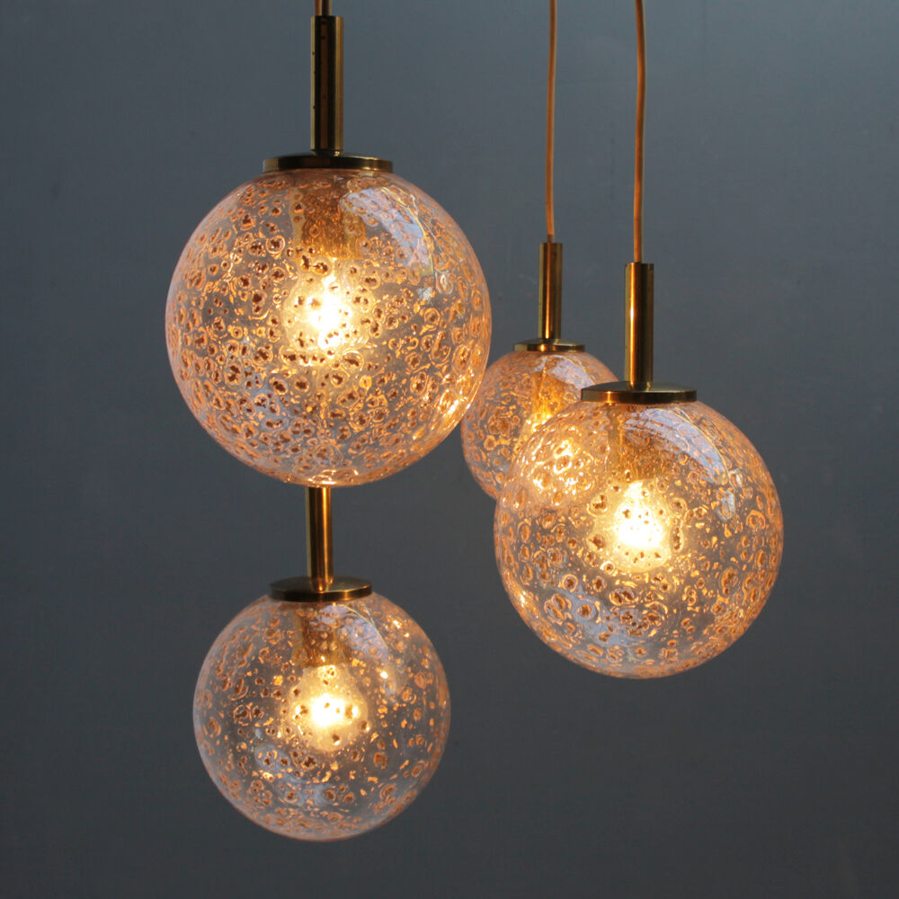 Four gold fleck globe pendants by Doria Germany