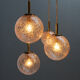 Four gold fleck globe pendants by Doria Germany