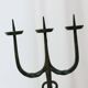 Black hand-forged iron candleholder statue with mid-century, 70s Brutalist tripod design