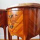 Pair of Louis XV style bedside tables with marquetry and marble.