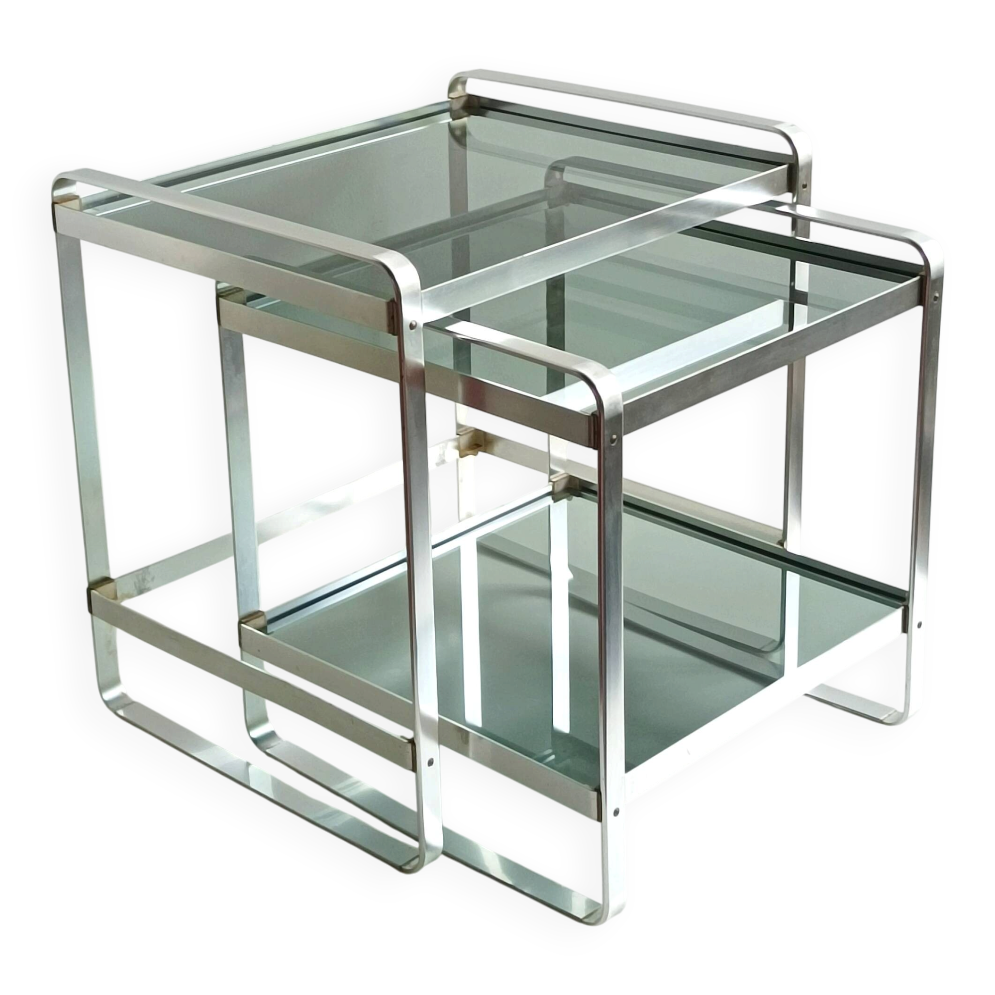 Nested tables in aluminium and smoked glass by Martini & Rossi, 1970s.