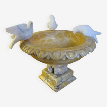 Vintage birdbath with three alabaster birds