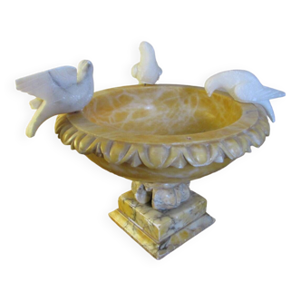 Vintage birdbath with three alabaster birds