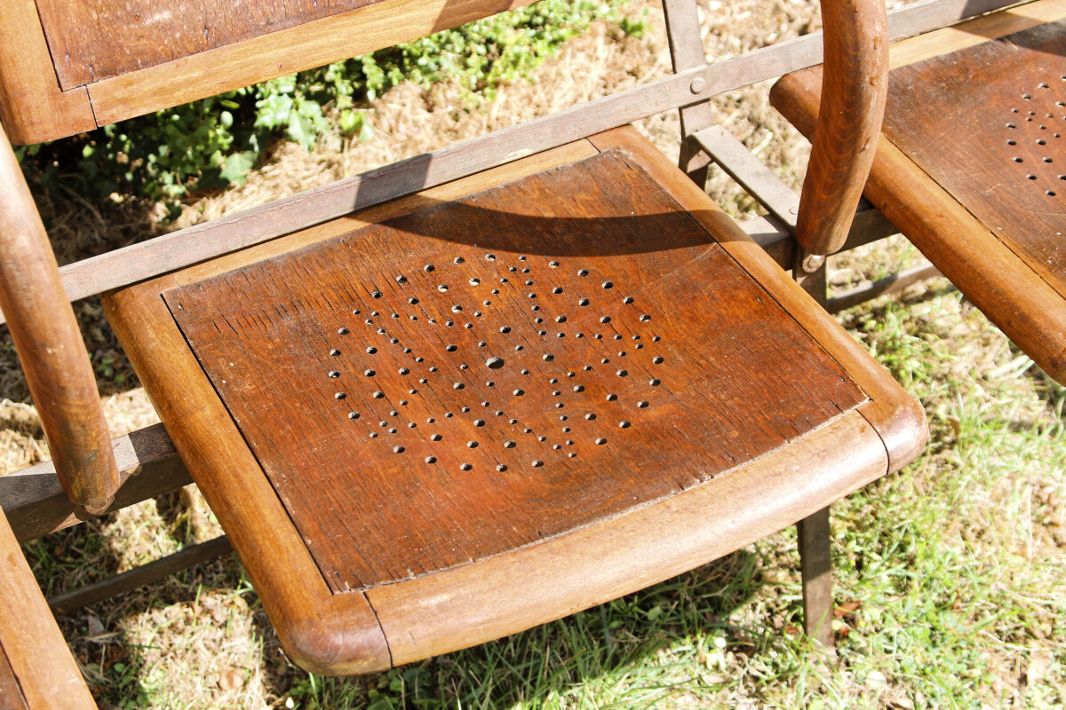 Row of theater folding seats, early twentieth century