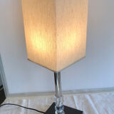 Silver floor lamp with a straight shade.
