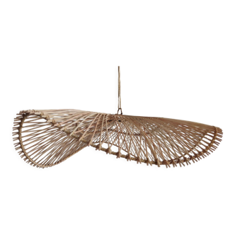 Rattan suspension or lighting fixture in the shape of an undulating circular tray with lattices